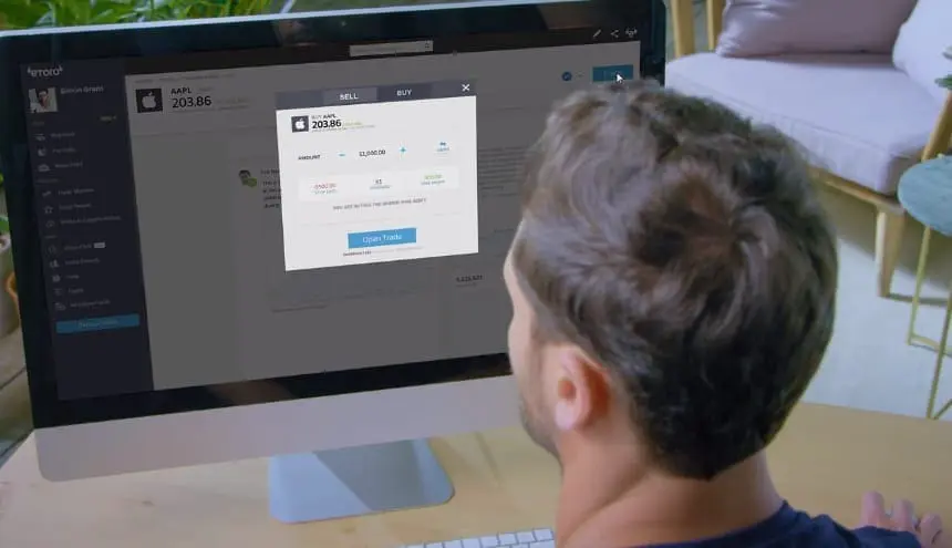 Simon trading stocks on eToro