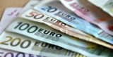 Euro Slips Against the Dollar, Italy’s Coalition