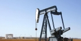 Oil Slides 1% Ahead of Iranian Sanctions